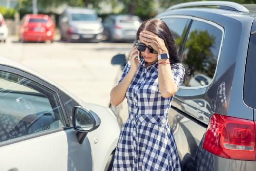 Fort Lauderdale Team Secures Defense Verdict for Client in Premises Liability Lawsuit Woman worried after collision in parking lot