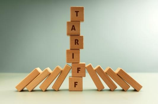 Managing Tariff Volatility in Cross‑Border U.S. Construction Projects: Practical Contract‑Drafting and Procurement Strategies Tariff blocks