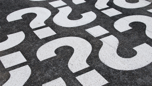 Is a Violation of a COVID-19 Order the Basis For Civil Liability? White question marks on cement