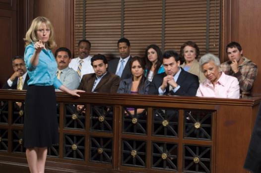 Proving and Defending Against Construction Defect Damages Lawyer talking to jury
