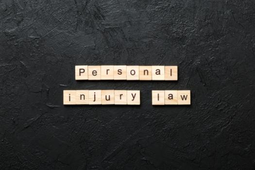 Personal injury law on scrabble tiles