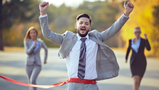 Edward Beitz and William Taylor Recognized by US News – Best Lawyers as a "Lawyer of the Year" Businessman crossing finish line