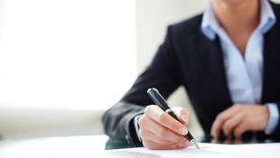 The Best Laid Plans: Contingency in a Construction Contract Businesswoman signing document