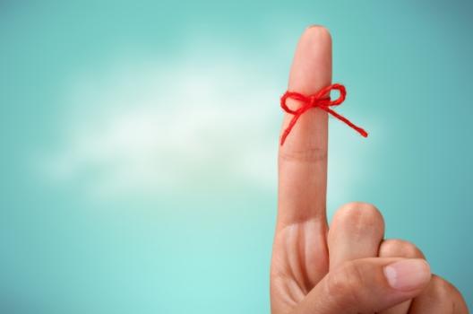 String tied on finger