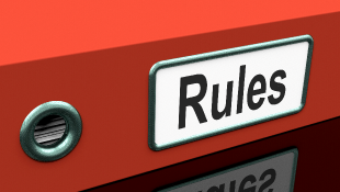 The Goldilocks Rule: Panel Rejects Proposed Insurer-Specific MDL Proceedings for Four Large Insurers, but Establishes MDL Proceeding for the Smallest Rules word on side of notebook
