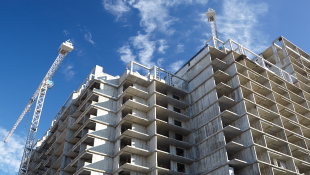 Insurer Must Pay for Matching Siding of Insured's Buildings Building