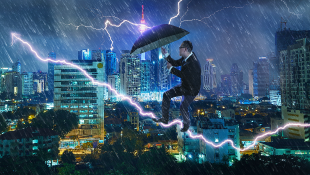 Partner Jonathan R. Harwood Obtained Summary Judgment in a Coverage Action Arising out of a Claim for Personal Injury Businessman with umbrella battling thunderstorm with highrises behind him