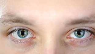 As Florence Eyes East Coast, Are You Looking At Your Insurance? Closeup of eyes