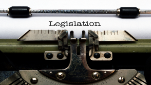 Legislation Update: S-865 Public-Private Partnerships in New Jersey Passed by Both Houses-Awaiting Governor’s Signature Typewriter with paper saying Legislation