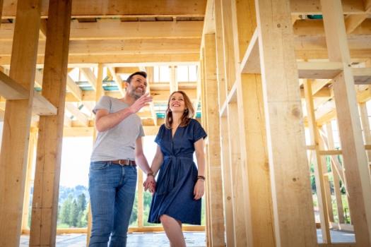 People in house being built