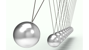 Newton cradle showing energy and gravity
