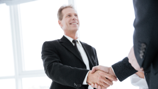 Two businessmen shaking hands