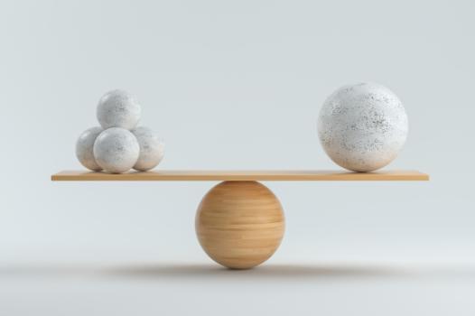 Rocks balanced on scale