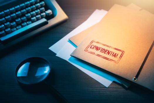 (Don’t) Go Fish Confidential file next to typewriter