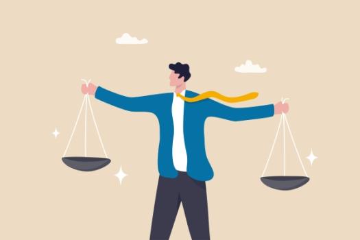The Grenfell & Champlain Towers: Risk Management Considerations in the Wake of Catastrophic Loss — A UK/US Comparison Illustration of man holding two weights scale