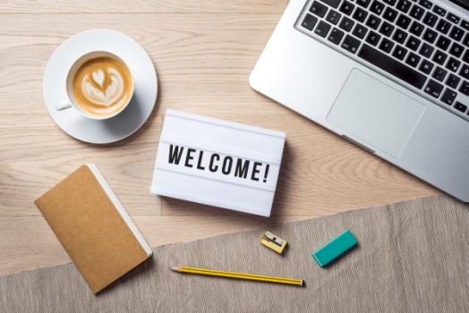 Ball Janik LLP Welcomes Construction Defect Attorney and U.S. Air Force Veteran Jake Scott to its Fort Lauderdale Office Welcome next to Laptop