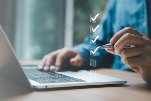 A Permitting Base Checklist for Data Centers and Power Plants Checklist on laptop