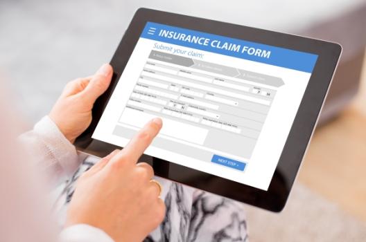 Insurance claim form on tablet