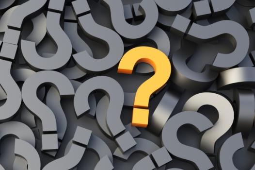Grey question marks with one yellow question mark
