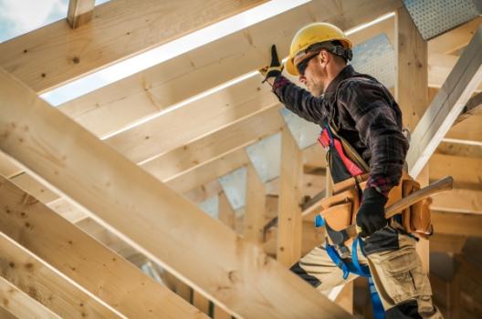 Construction worker framing house