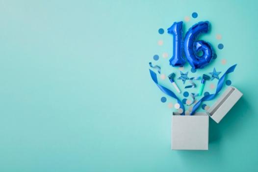 The Firm Turns 16! Sixteen and confetti spring from box