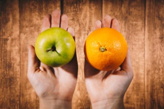 The “Pay When Paid” Clause in California Construction—Strategies as the Battle Continues Hands holding apple and orange