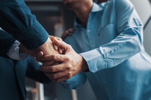 Attorney and client shaking hands