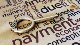 Pandemic Magnifies Financial Risk in Construction: What Executives Can Do to Speed up Customer Payments Golden key lying on payment word text