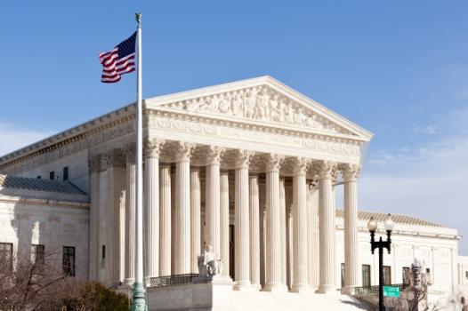 Arizona Supreme Court Clarifies Parties’ Post-Default Conduct Cannot Validate Void Default Orders Courthouse exterior