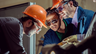 'Right to Repair' and Fixing Equipment in a Digital Age Workers repairing machine