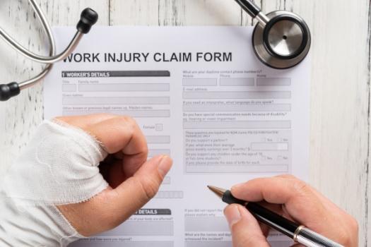 NY Appellate Court Clarifies Hearsay Standards For Admission of Accident-Related Entries in Medical Records Person filling out a work injury report
