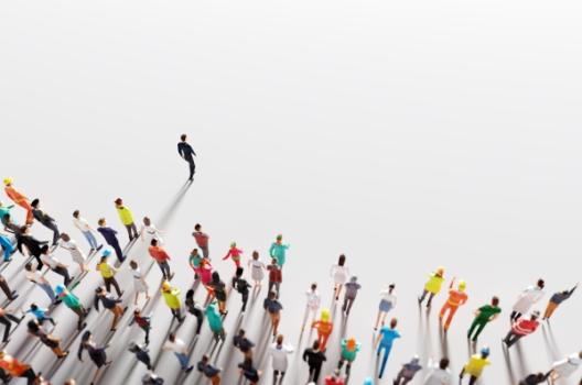 Perspectives from Pioneers: Kenneth C. Gibbs Business person leading a crowd