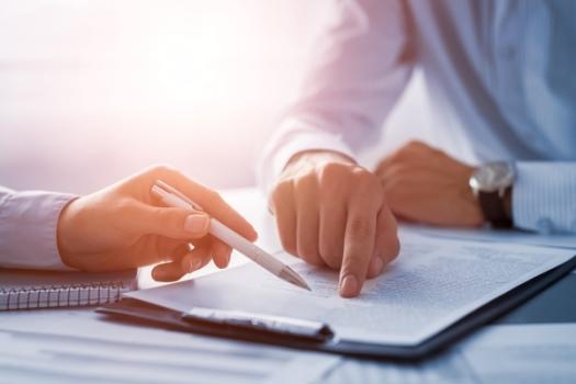 Notice Provisions in Contracts Matter Person pointing at contract