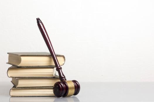 Owner Taking Assignment of General Contractor’s Claims Against a Subcontractor(s) Gavel leaning on law books