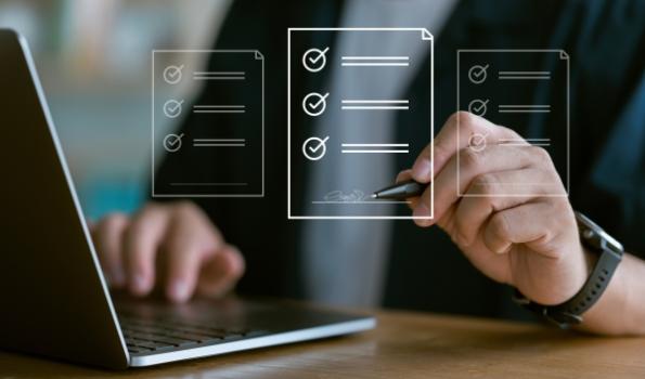 Endorsement is Void Where Compliance is Impossible Person signing contract on computer