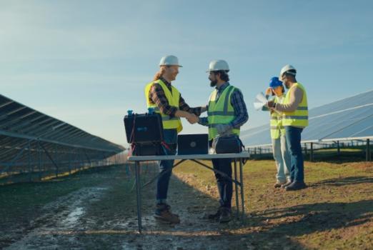 Builders Risk/Construction All Risks and Delay in Start-Up Coverage for Large Energy Projects: Protecting Revenue Before Operations Begin Workers on solar project site
