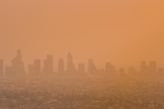 "Resilient Rebuild Hub" Helps Wildfire-Impacted Homeowners Build Back Stronger Smoke over downtown LA skyline