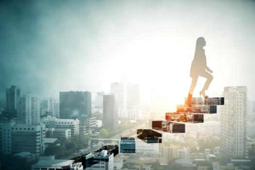 Special Counsel Lorelie (Lorie) Masters Appointed Chair of the ABA’s Commission on Women in the Profession Woman walking up steps in sky