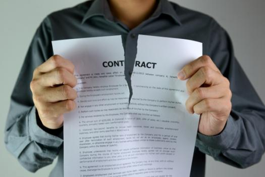 Your AI Tool Could Be Your Next Breach of Contract Contract being ripped