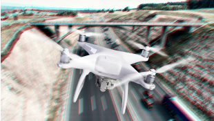 Drone flying over bridge