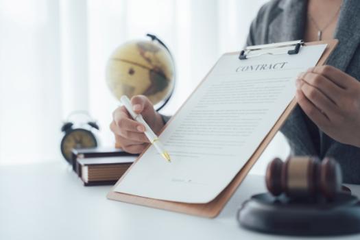 Person pointing at contract