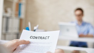 Someone holding a contract