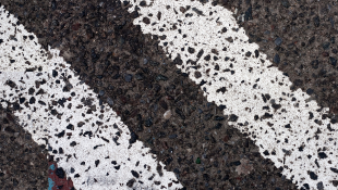 Digital Twins – Interview with Cristina Savian Twin white lines painted on street asphalt