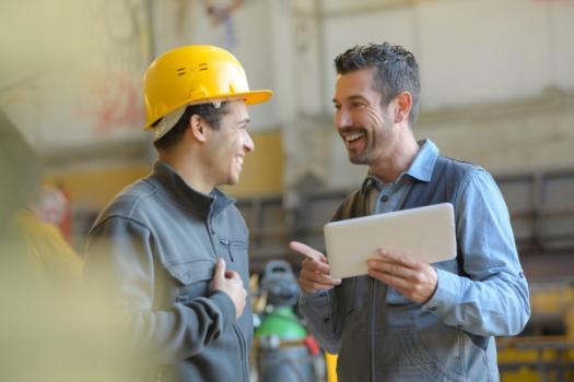 Nonresidential Construction Adds Healthy 19,000 Jobs in April Construction Workers smiling