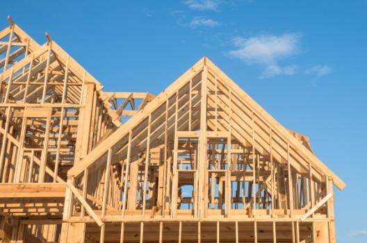 US Housing Starts Surge on Rebound in Multifamily Construction Home frames