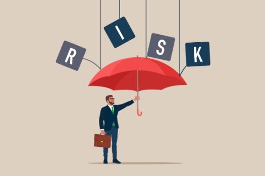 Risk Umbrella businessman